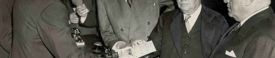 March 15, 1939: Luncheon at the Biltmore to plan the opening for union station. Guests get their tickets punched by railroad conductors.