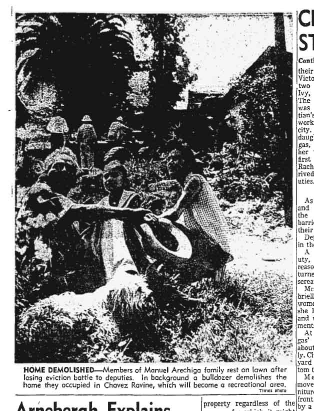 May 9, 1959: Members of the Arechiga family watch as their home is razed. 