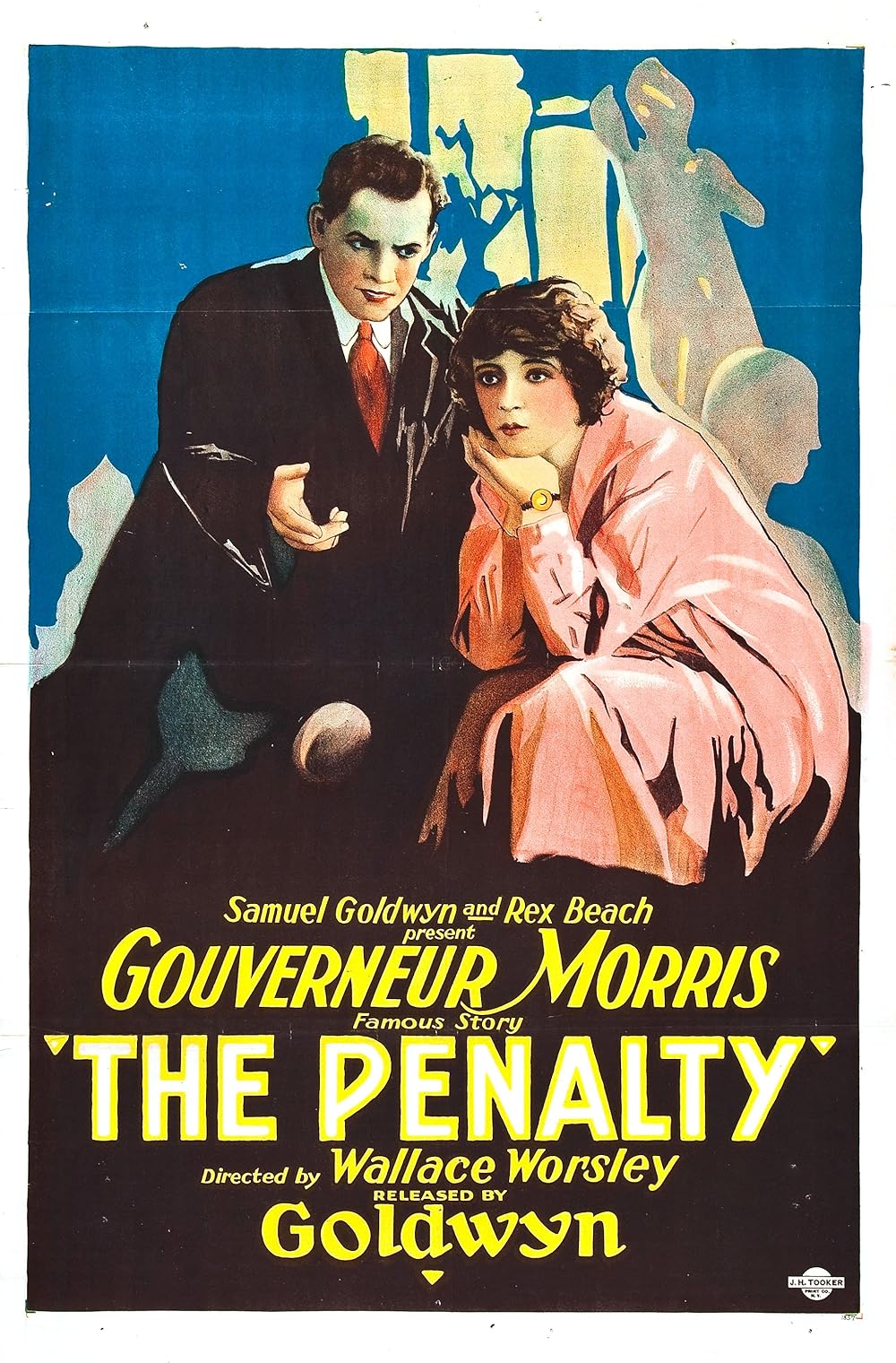 Lon Chaney in a vintage poster for The Penalty, showing Chaney playing an amputee with a woman sitting next to him.