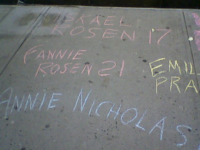March 26, 2011: Fire victims' names chalked on the sidewalk 