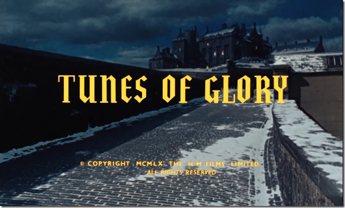 Tunes of Glory. At night, a snowy brick road leading to an elaborate Scottish fort on a distant hill