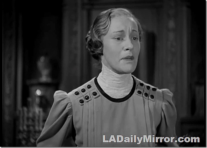 Woman in a Victorian outfit with a high collar