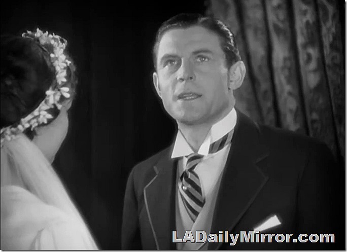 Young man in a tuxedo with a wing collar