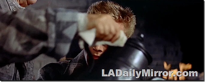 April 20, 2022, Mystery Photo. An arm holding an old-fashioned coffeepot blocks our mystery guest. 