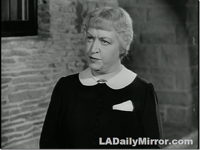 Woman with short haircut, peter pan collar