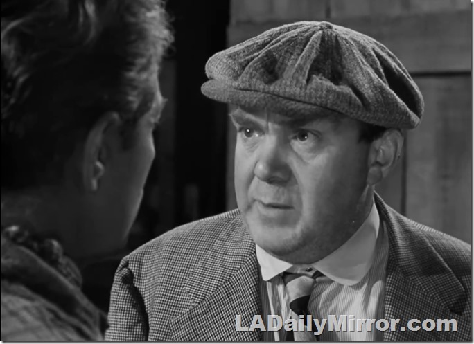 A stylish mystery fellow in a splendid newsboy cap. And a checked coat. Also Back of the Head Guy.