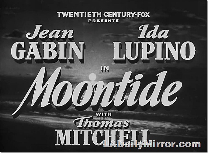 Credits over a shot of a full moon over the ocean