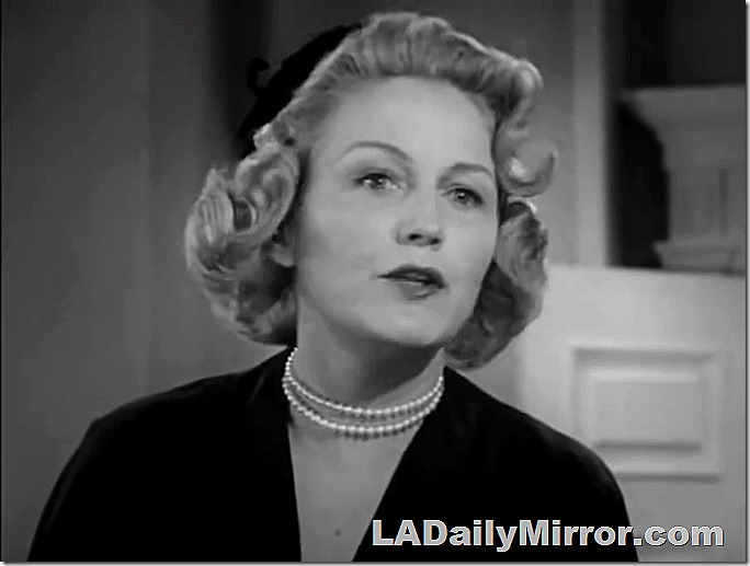 Mystery woman in pearls