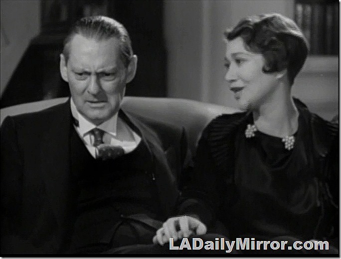 Mystery couple sitting on an old-fashioned couch