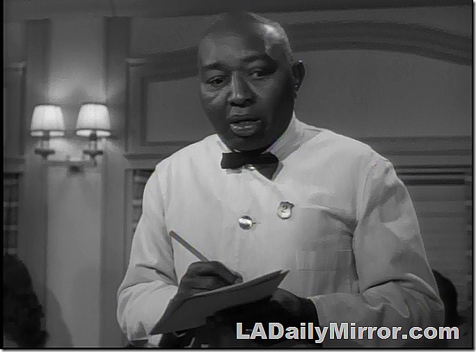 A waiter takes your order 