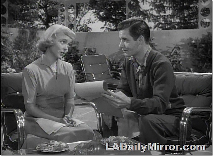 Young couple in lawn chairs