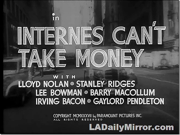 Main title. Letters over ambulance rushing through streets of New York