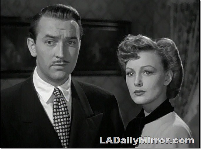 A mystery man and mystery woman. 