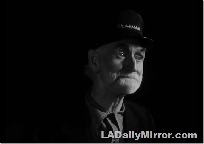 Dec. 19, 2022, Mystery Photo. A Man with a beard. His cap says flagman