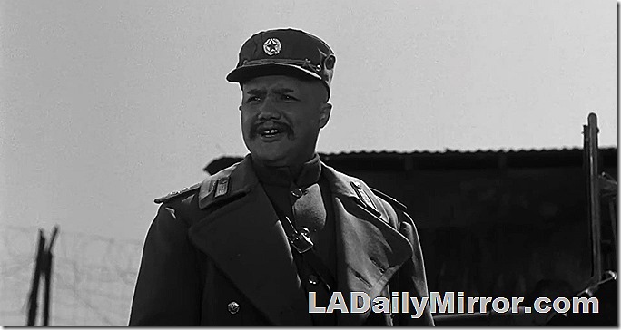 Man in uniform. With mustache (the man, not the uniform). 