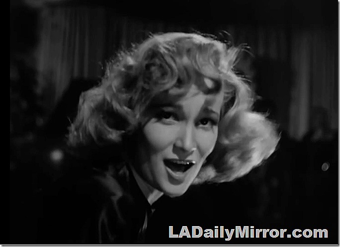 Woman with somewhat disheveled hair. 