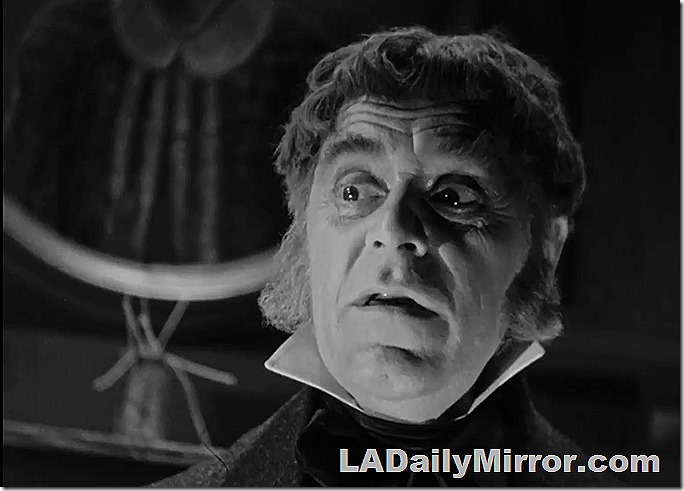 Man in a high collar with an astonished expression