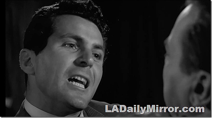 Man with angry expression who is choking the man in the other picture. 