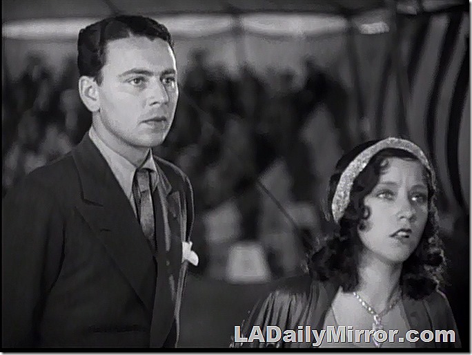 Handsome man who wants to take the leading lady away from all of this. 