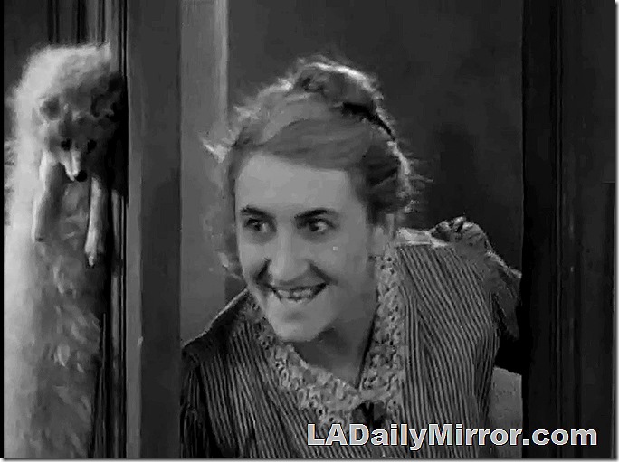 Woman in doorway. Also some sort of dead animal that does not approve of such goings-on. Woman in doorway. Also some sort of dead animal that does not approve of such goings-on.