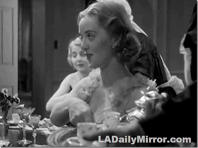 Woman at dinner table. Woman at dinner table.