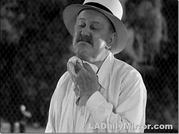 Older man with a mustache, wearing a hat and a white shirt. Older man with a mustache, wearing a hat and a white shirt.