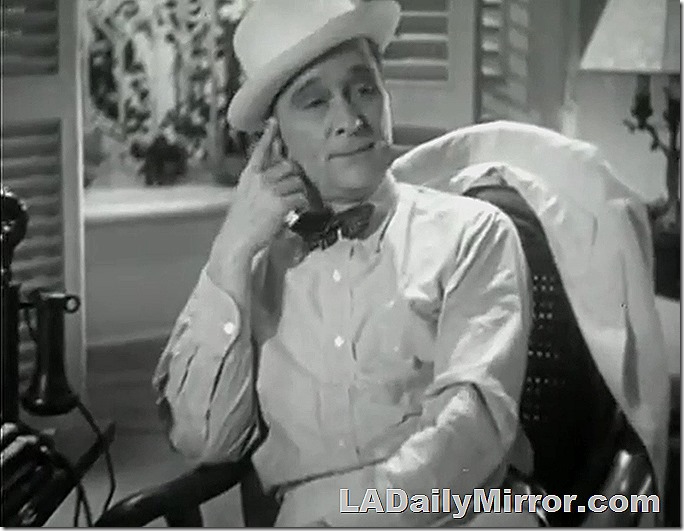 Man wearing bowtie and hat