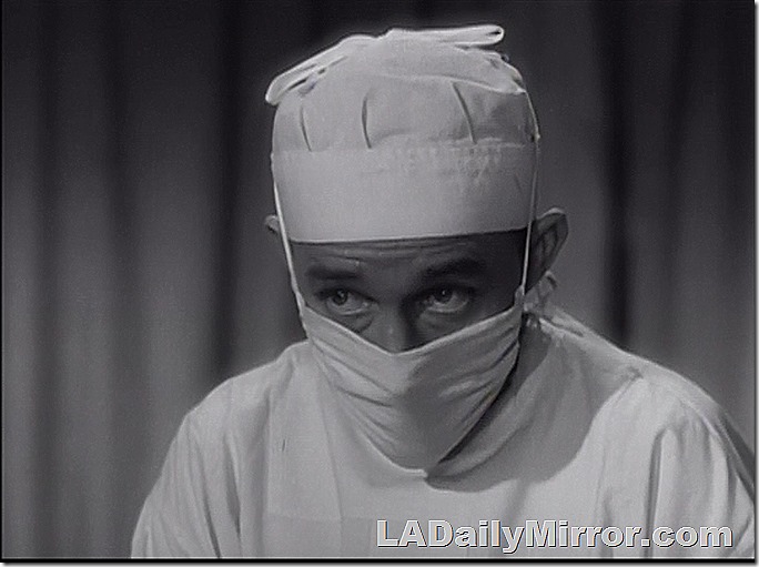 Mystery doctor No. 2 doing mysterious doctor things. 