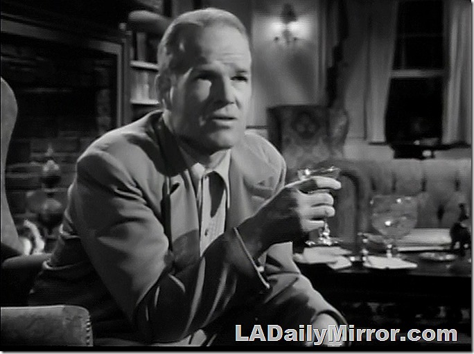 Mysterious man having a drink.