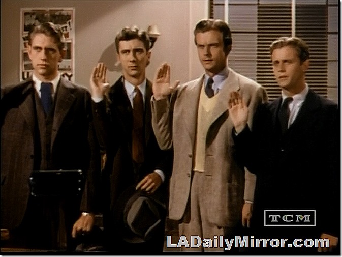 Young men raising their right hands. Young men raising their right hands.