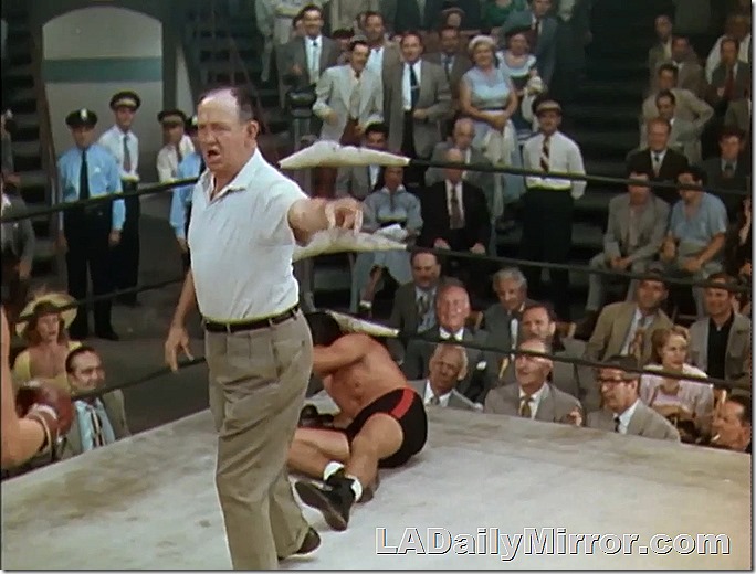 Mystery fellow in the ring. Our mystery lead is on the canvas. 