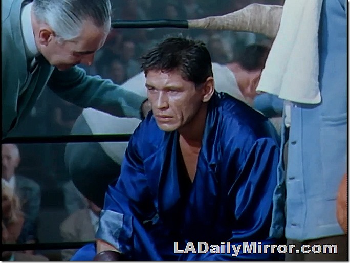 Mysterious boxer in an electric blue robe. 