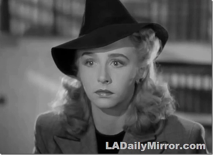 Mystery woman in fabulous hat. 