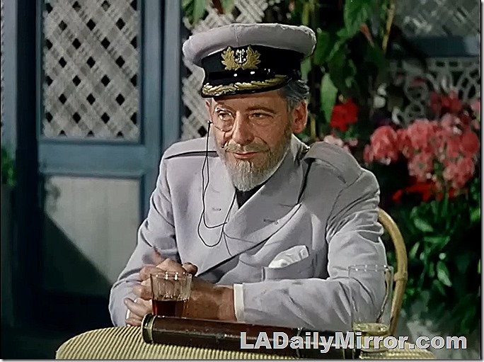 Dashing mystery guest with monocle doing mysterious guest with monocle things.  