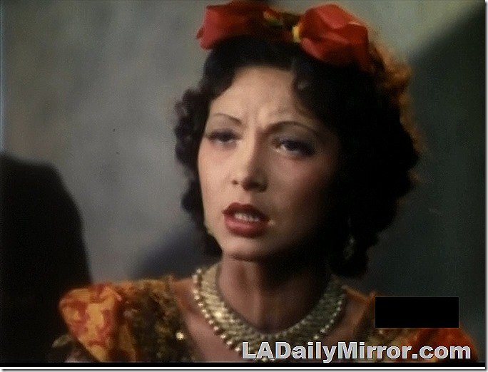 Lady in colorful Mexican outfit. 