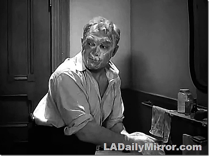 Mystery fellow with face lathered up about to shave Mystery fellow with face lathered up about to shave