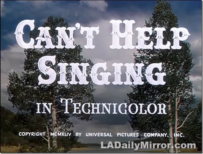 Main Title: Lettering over shot of trees and clouds