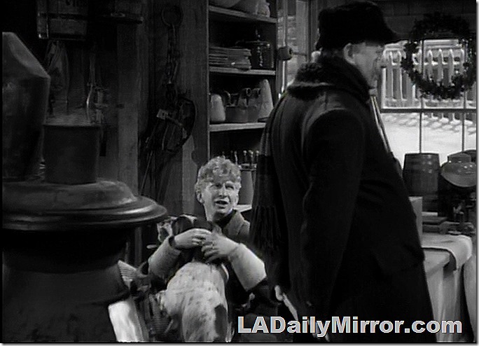 Mystery man holds mysterious dog. 