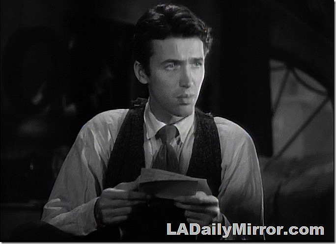 Man in shirt, tie and vest. 