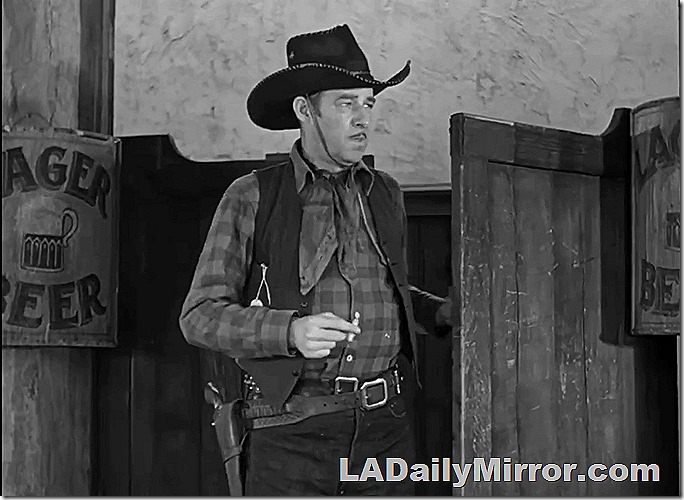 Mysterious desperado in black hat