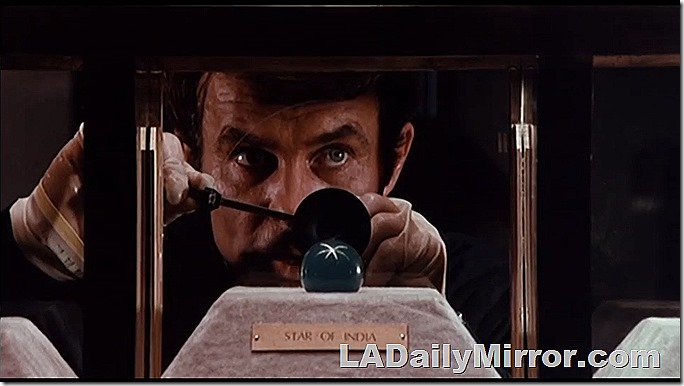 Mystery man and mysterious gem. 