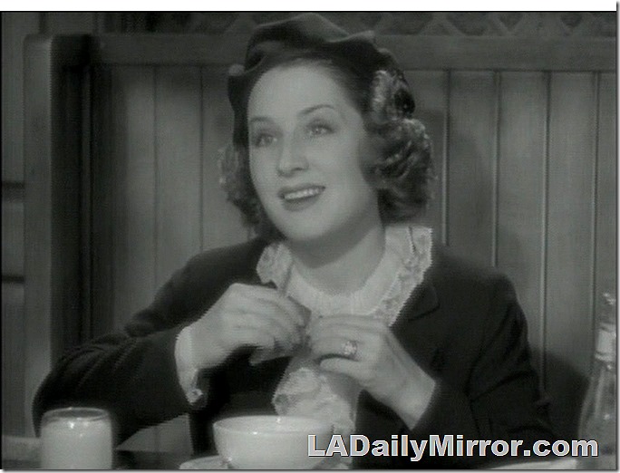 Woman in restaurant booth