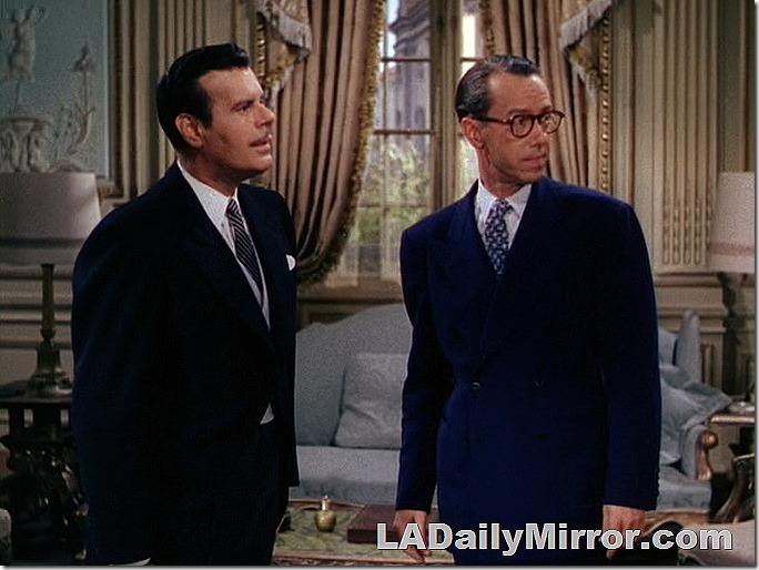 Well dressed men with puzzled expressions. Well dressed men with puzzled expressions.