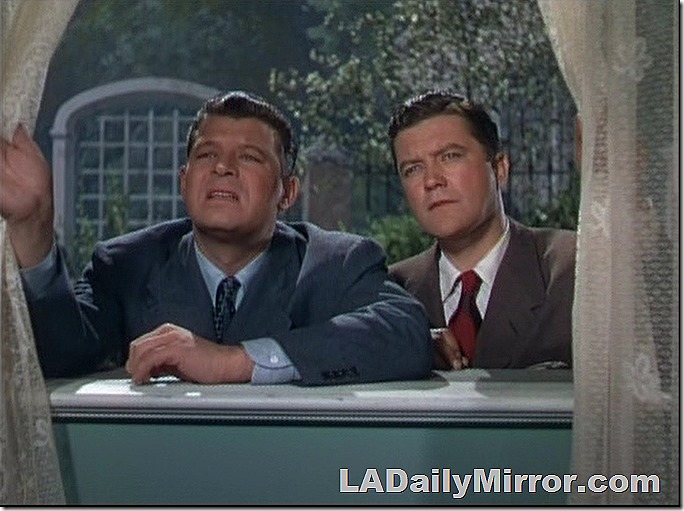 Two mysterious gents peering in a window. 