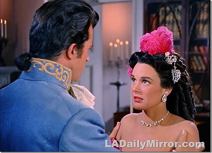 Elegantly dressed woman in period costume