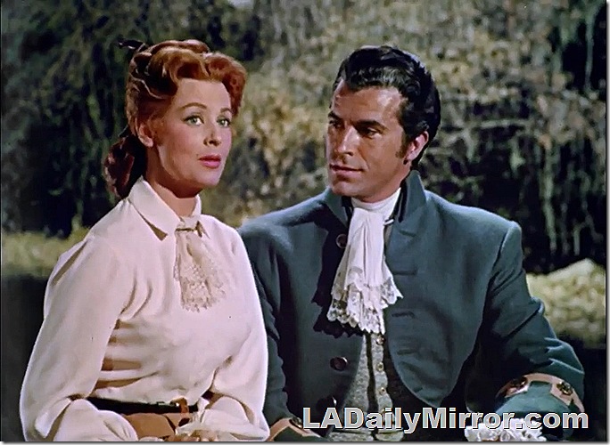 Mystery leading lady with red hair. Our mysterious leading man gazes at her intently, dressed in period finery. Mystery leading lady with red hair. Our mysterious leading man gazes at her intently, dressed in period finery.