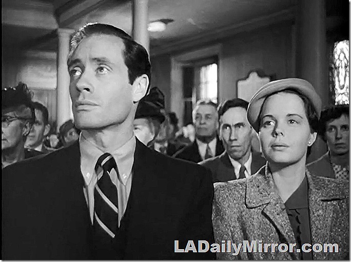 Mystery man in coat and tie with mysterious woman. Mystery man in coat and tie with mysterious woman.