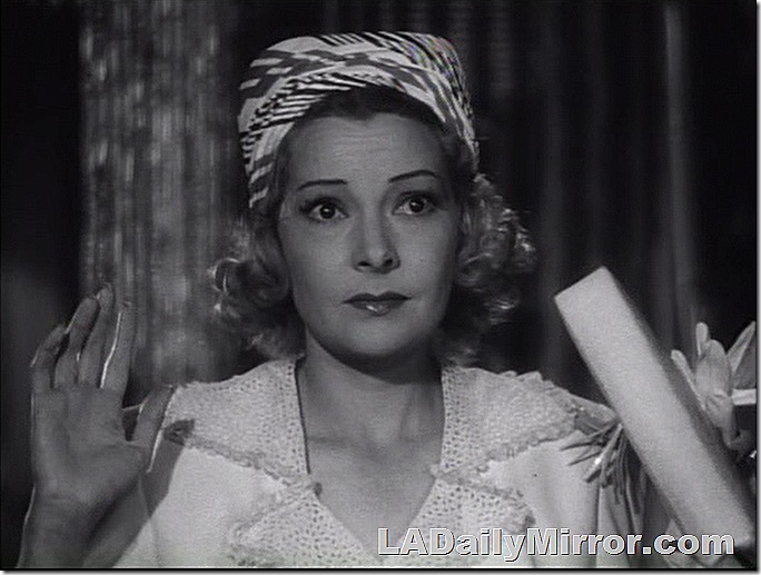 Woman with a scarf on her head, her hands are raised. Woman with a scarf on her head, her hands are raised.