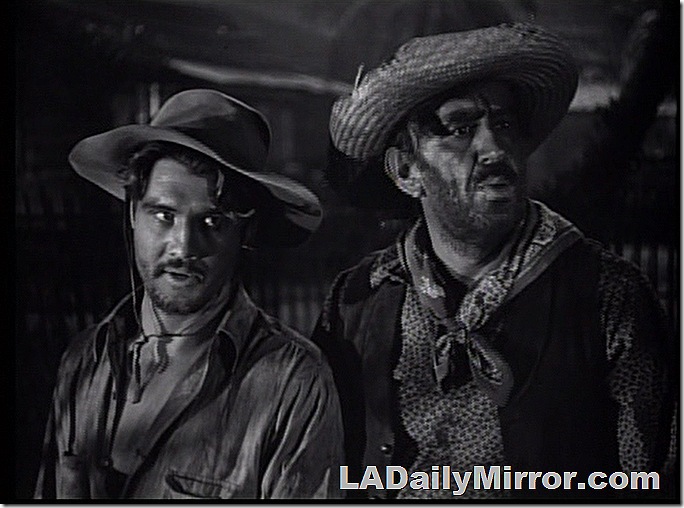 Two rough, unshaven men in battered hats. Two rough, unshaven men in battered hats.