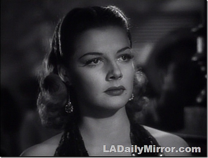 Woman in evening outfit, with earrings. Woman in evening outfit, with earrings.